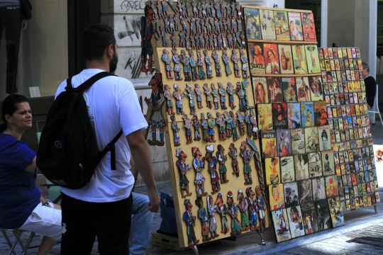 Postcards and souvenirs at a street stall in Athens