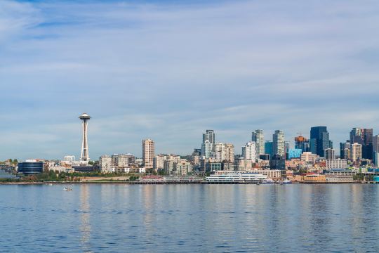 Seattle skyline seen across Lake Union, with the Space Needle on the left and the downtown towers along the water