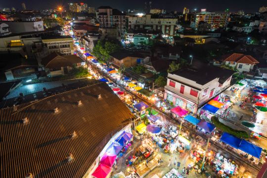Night market stalls lit along Chang Khlan Road, the heart of the Night Bazaar Area in Chiang Mai