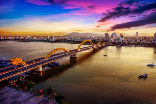 Dragon Bridge over the Han River beside downtown Da Nang hotels
