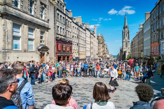 A street performer on the Royal Mile in Edinburgh's Old Town