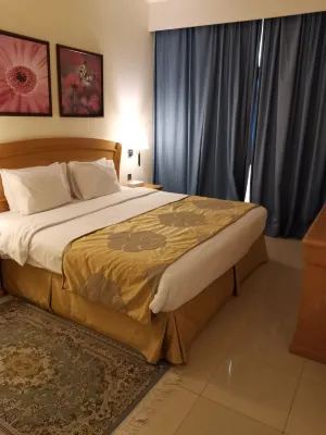 Golden Tulip Sharjah Номера Photos