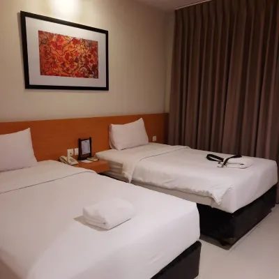 Hotel d'Season Premiere Jepara Kamar Photos