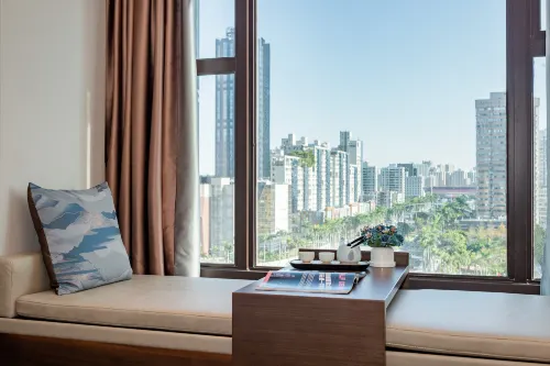 Meiqiu Holiday Hotel (Zhuhai Gongbei Port Branch) Rooms Photos