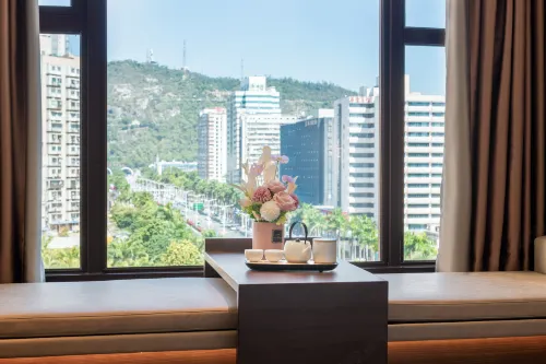 Meiqiu Holiday Hotel (Zhuhai Gongbei Port Branch) Rooms Photos