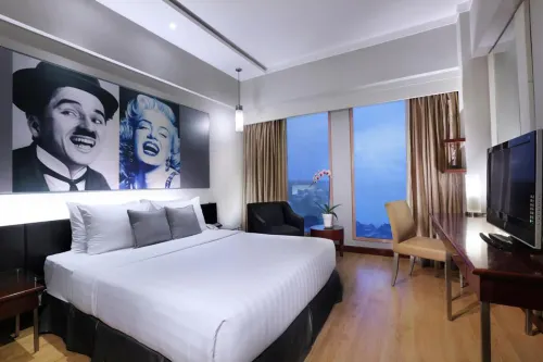 Grand Candi Hotel Rooms Photos