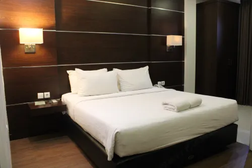 Hotel d'Season Premiere Jepara Kamar Photos