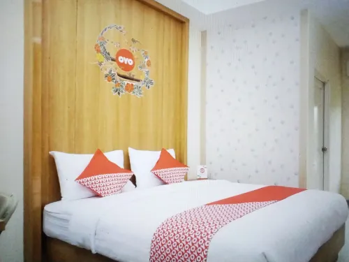 OYO 999 Garuda Guesthouse Chambres Photos