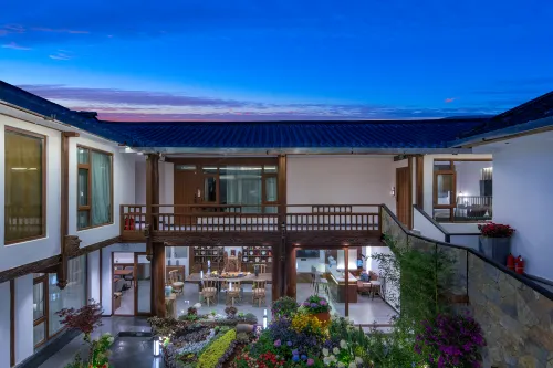 Yihe QIshe Inn (Lijiang Dashuiche Shop) Общественные зоны Photos