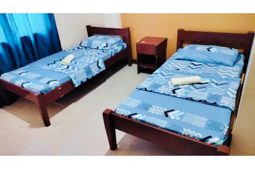 OYO 871 Herel Guest House Chambres Photos