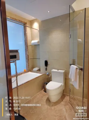 Xin Hai International Holiday Hotel Chambres Photos