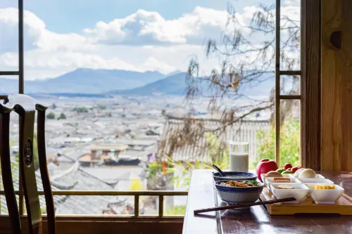 Lijiang Fengyasong Wenjinyuan Chinese Inn · Naxi Guyuan Ristorazione Photos