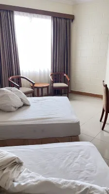 Hotel Mega Lestari Chambres Photos