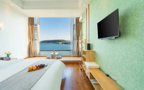 Qingwu Hotel Rooms Photos