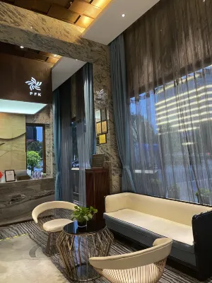 PFKBoutiqueHotel (Xianju Yangmei Huashang Tiancheng Wuyue Plaza) Rooms Photos