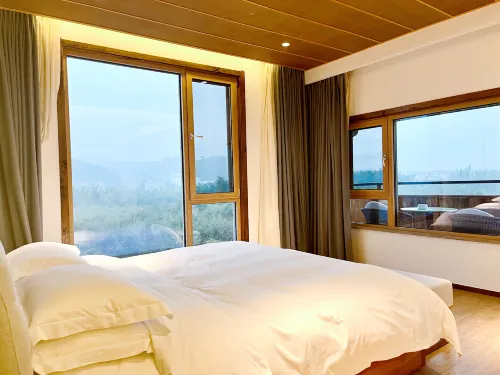 Qiyun·Anji Chashan Yelu Hot Spring Homestay الغرف Photos
