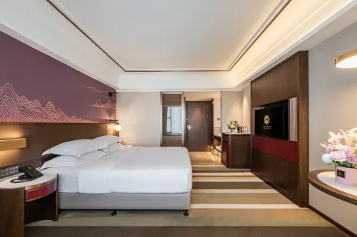 Meiqiu Holiday Hotel (Zhuhai Gongbei Port Branch) Rooms Photos