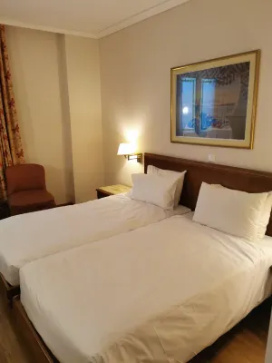 Titania Hotel Chambres Photos