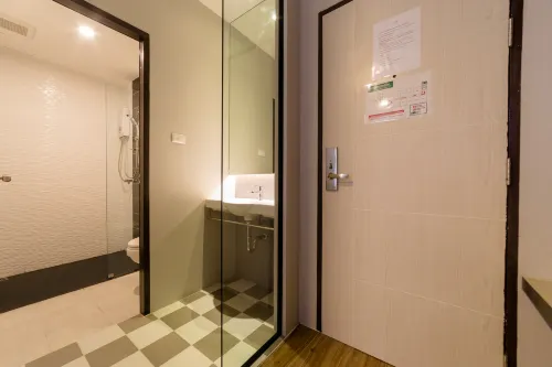 Z Sleep Hotel Kamar Photos