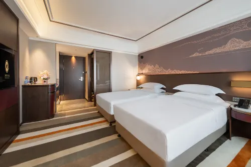 Meiqiu Holiday Hotel (Zhuhai Gongbei Port Branch) Rooms Photos