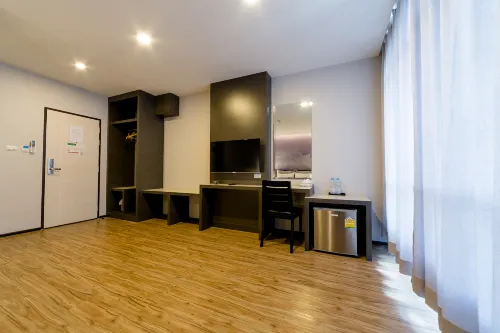 Z Sleep Hotel Kamar Photos