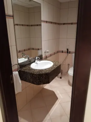 Golden Tulip Sharjah Номера Photos