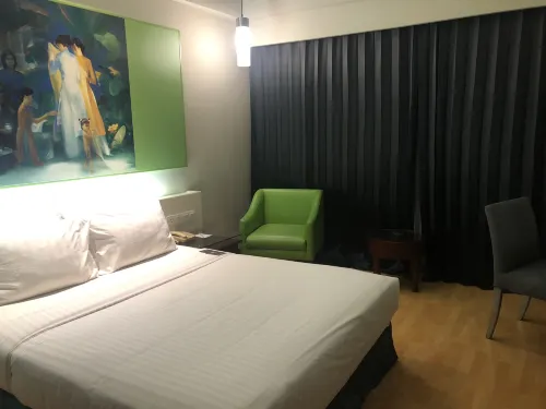 Grand Candi Hotel Rooms Photos