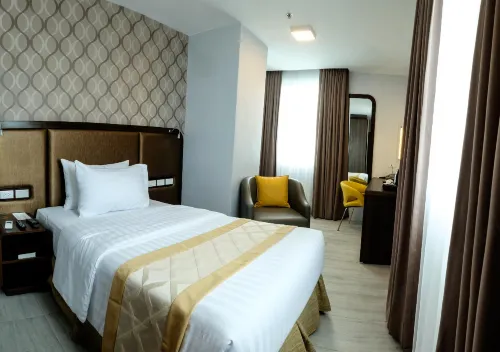 One Central Hotel & Suites Rooms Photos