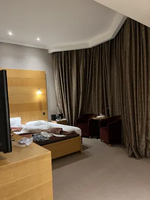 The Park City Grand Plaza Kensington Hotel Camere Photos
