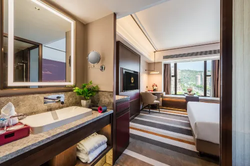 Meiqiu Holiday Hotel (Zhuhai Gongbei Port Branch) Rooms Photos