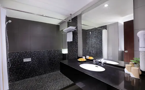 Grand Candi Hotel Rooms Photos