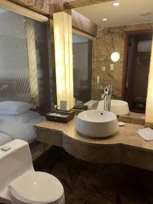 Kunming Green Land Hotel Chambres Photos