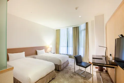 Taisugar Hotel Zimmer Photos