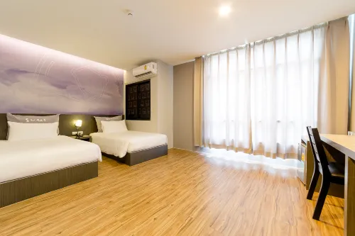 Z Sleep Hotel Kamar Photos