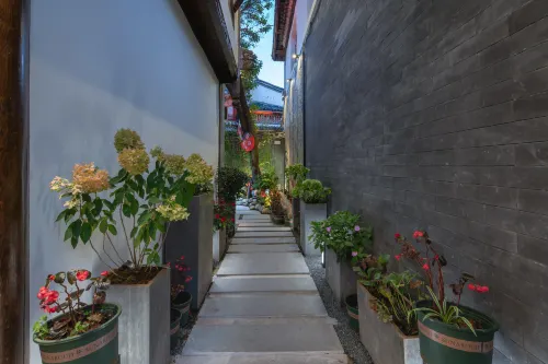 Yihe QIshe Inn (Lijiang Dashuiche Shop) Экстерьер Photos
