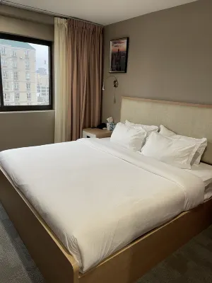 LIC Plaza Hotel Chambres Photos