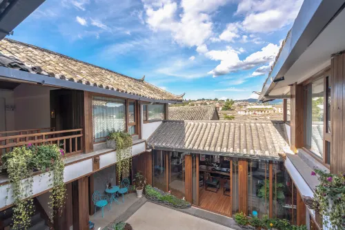 Yihe QIshe Inn (Lijiang Dashuiche Shop) Общественные зоны Photos