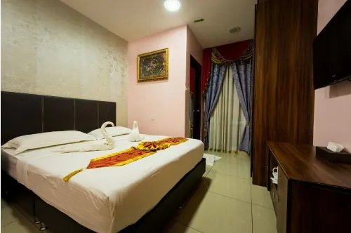 AB Inn Hotel Kamar Photos