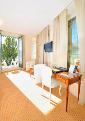 Hotel Eden Palace au Lac Zimmer Photos
