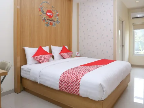 OYO 999 Garuda Guesthouse Chambres Photos