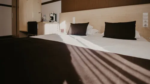 Promenade City Hotel Rooms Photos