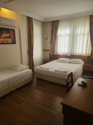 Triana Hotel Номера Photos