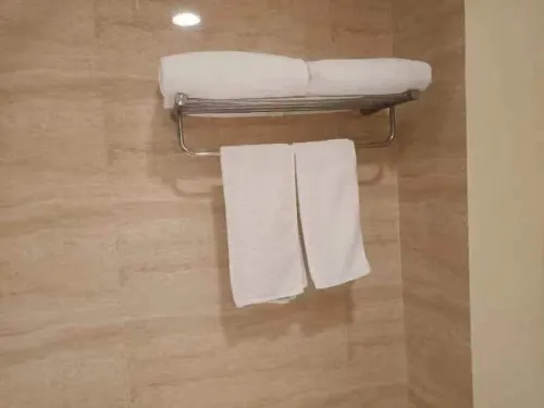 Qingdao Kuaitong International Hotel Zimmer Photos