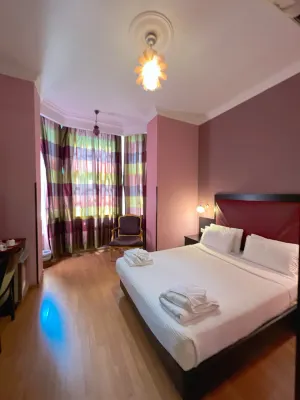 Delphi Art Hotel Rooms Photos