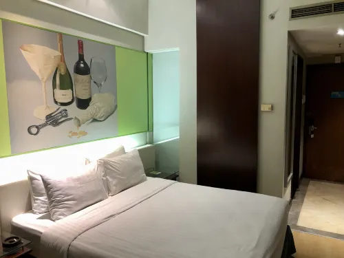 Grand Candi Hotel Rooms Photos