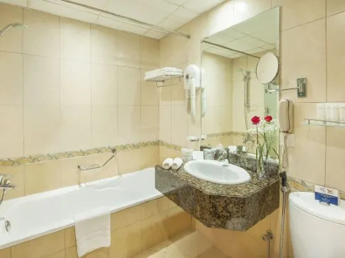 Golden Tulip Sharjah Номера Photos