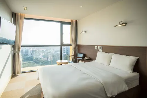 Sunrise Hotel Jungmun Branch Chambres Photos