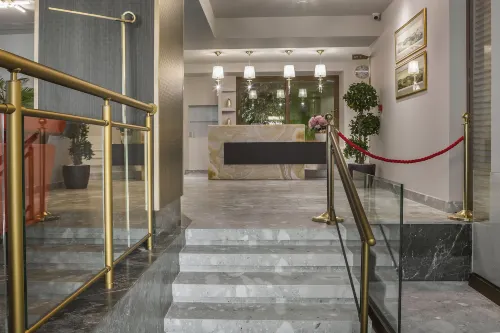 Royalty Hotel Athens Öffentliche Flächen Photos