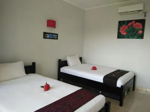 CF Komodo Hotel Kamar Photos
