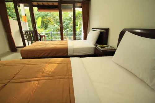 Omah D'Taman Hotel by EPS Kamar Photos